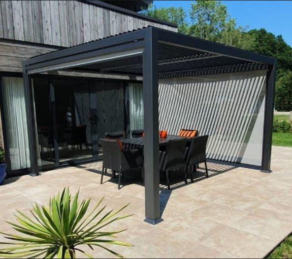 grey modern garden gazebo aluminium with slatted louvre roof contemporary setting