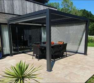grey modern garden gazebo aluminium with slatted louvre roof contemporary setting