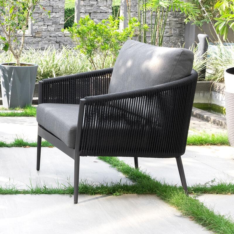 garden armchair modern lounge black grey modern all weather wicker side view black cushions grey moon outdoor lounging