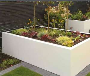 large modern garden trough planters in white fibreglass for modern contemporary outdoor gardens