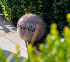 bespoke engraved 20 cm sandstone rainbow garden ball or sphere