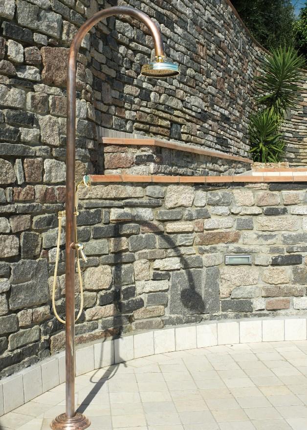 copper outdoor shower in antique copper and brass  luxury high quality shower outside in garden