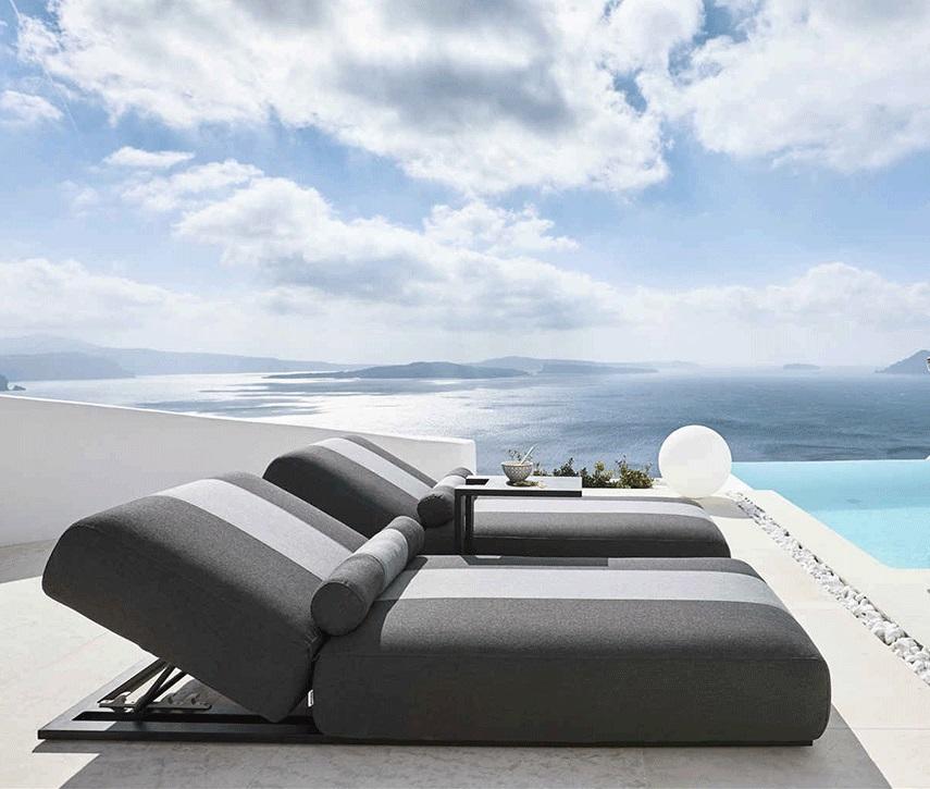 deep sun lounger daybed sunbed in grey weatherproof fabric by pool