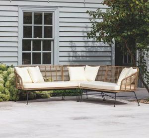 garden corner lounge sofa set with deep seat and back cushions in cream and all weather bamboo weave frames