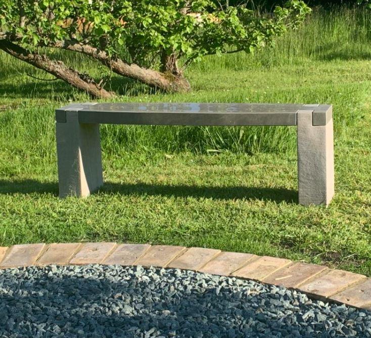grey modern garden bench in natural sandstone