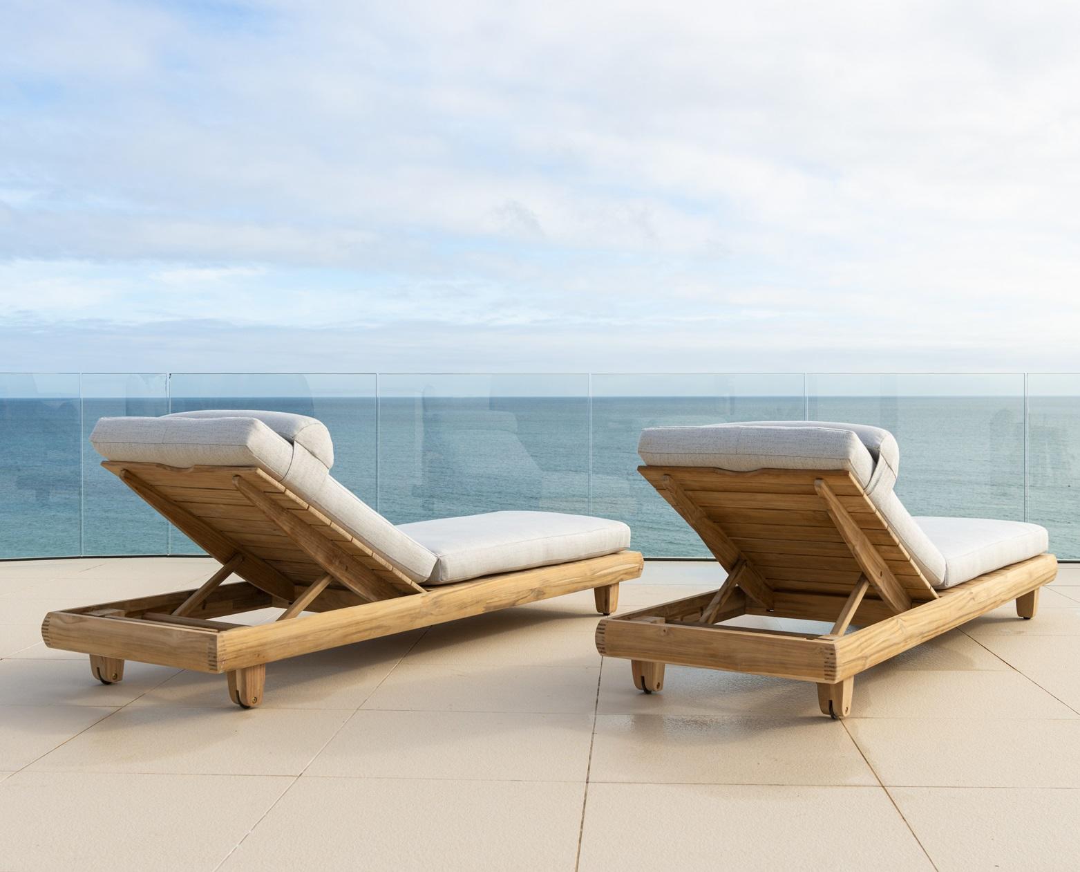 luxury hardwood teak garden sun lounger with weatherproof fabric cushions