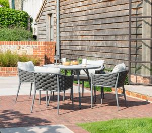 4 seater garden dining table in grey aluminium with ceramic glass top and all weather wide rope with light grey cushions