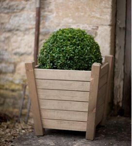 tapered garden planter in spruce wood with legs modern outdoor wooden planter