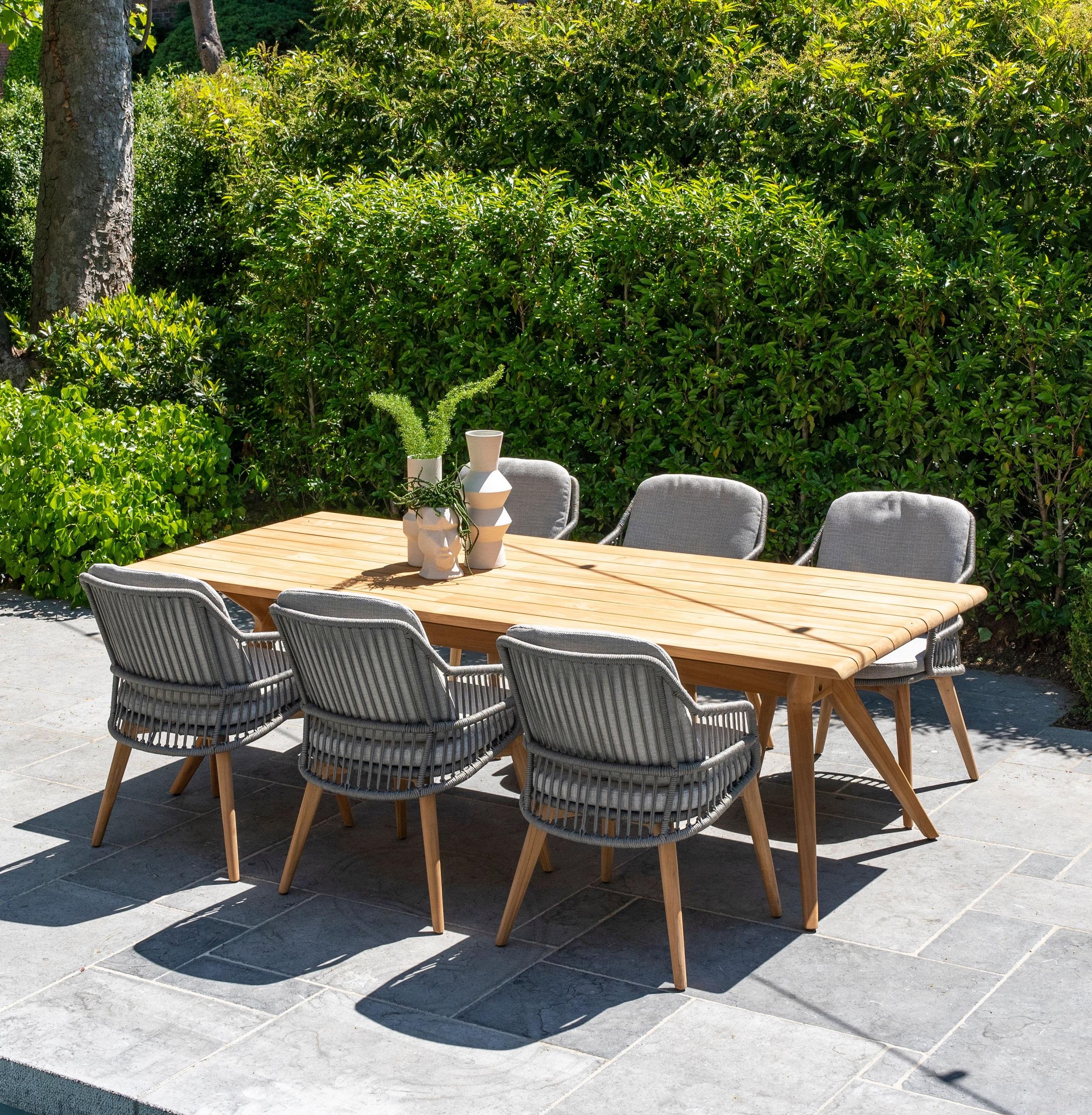 teak garden dining table and light grey all weather rope weave patio dining chairs