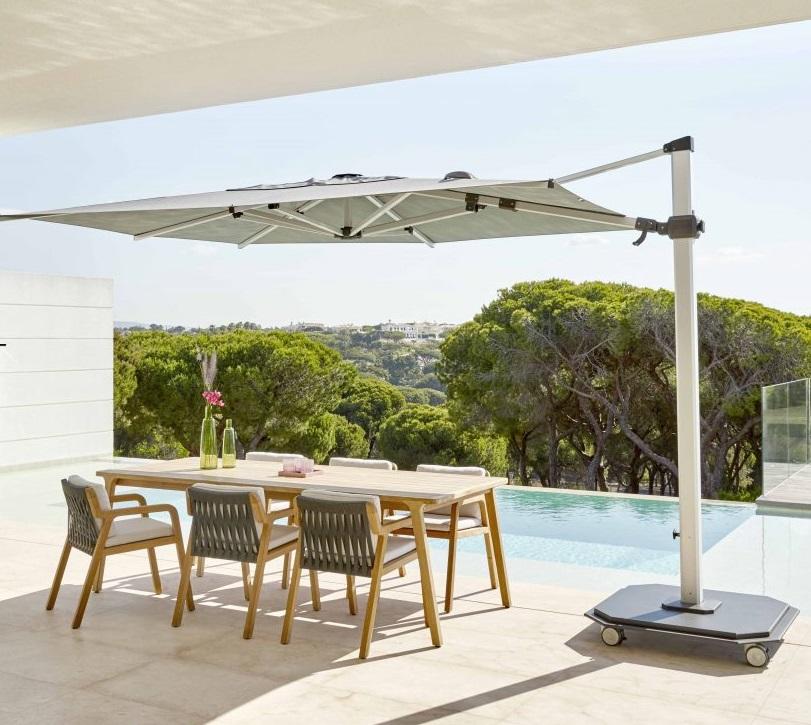 6 seater teak modern garden dining set under parasol