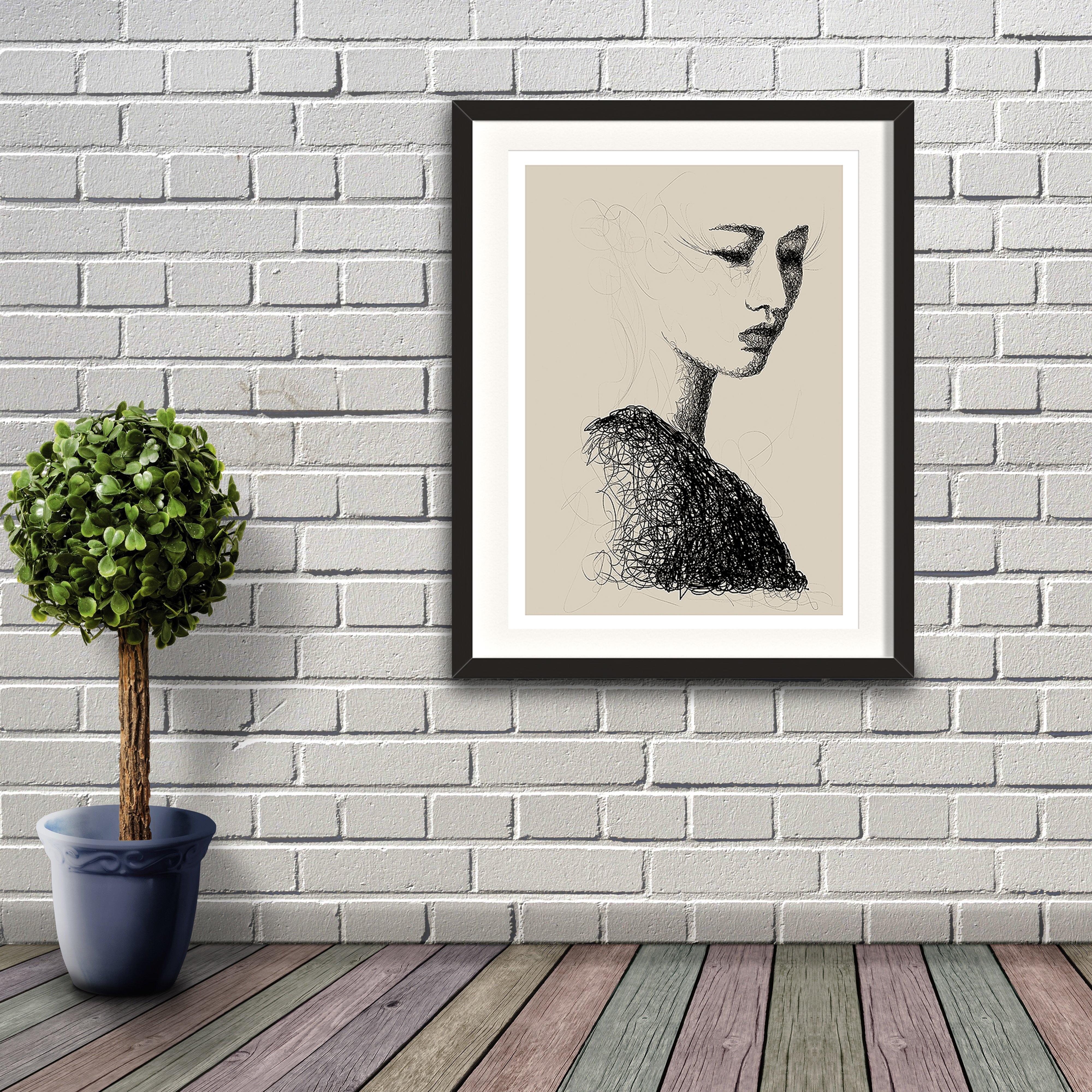 A digital painting called Line Study 1.0 by Lily Bourne showing a delicate female head contructed a swirling black line on a neutral background. Artwork shown in a black frame hanging on a brick wall.