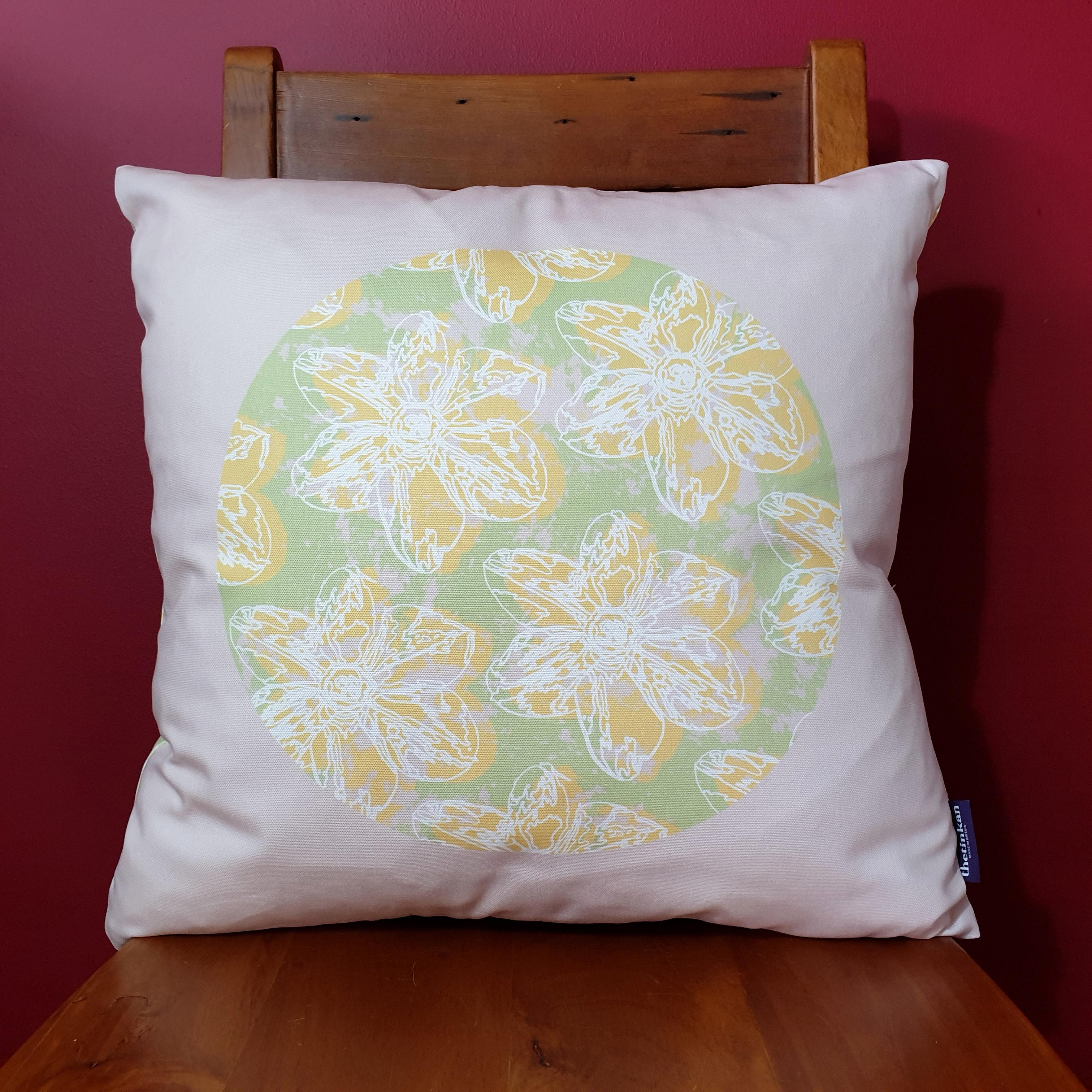 Double-sided 51cm square Flower Splash cushion designed by thetinkan. Yellow narcissus flower with white traced outline set in a mint green coloured circle with pale pink paint splashes and pale pink surround. Available with an optional luxury cushion inner pad. VIEW PRODUCT >>