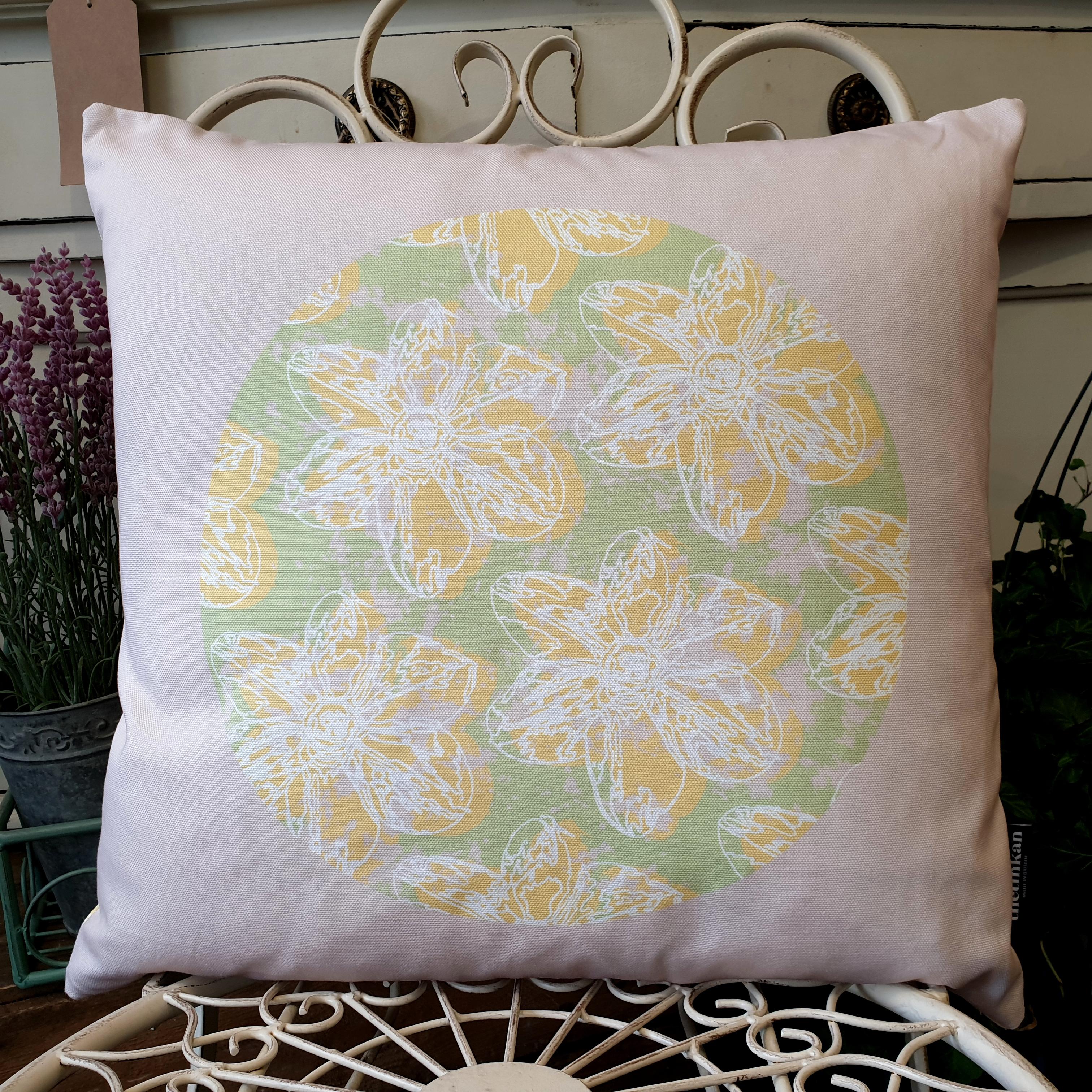 Double-sided 45cm square Flower Splash cushion designed by thetinkan. Yellow narcissus flower with white traced outline set in a mint green coloured circle with pale pink paint splashes and pale pink surround. Available with an optional luxury cushion inner pad. VIEW PRODUCT >>