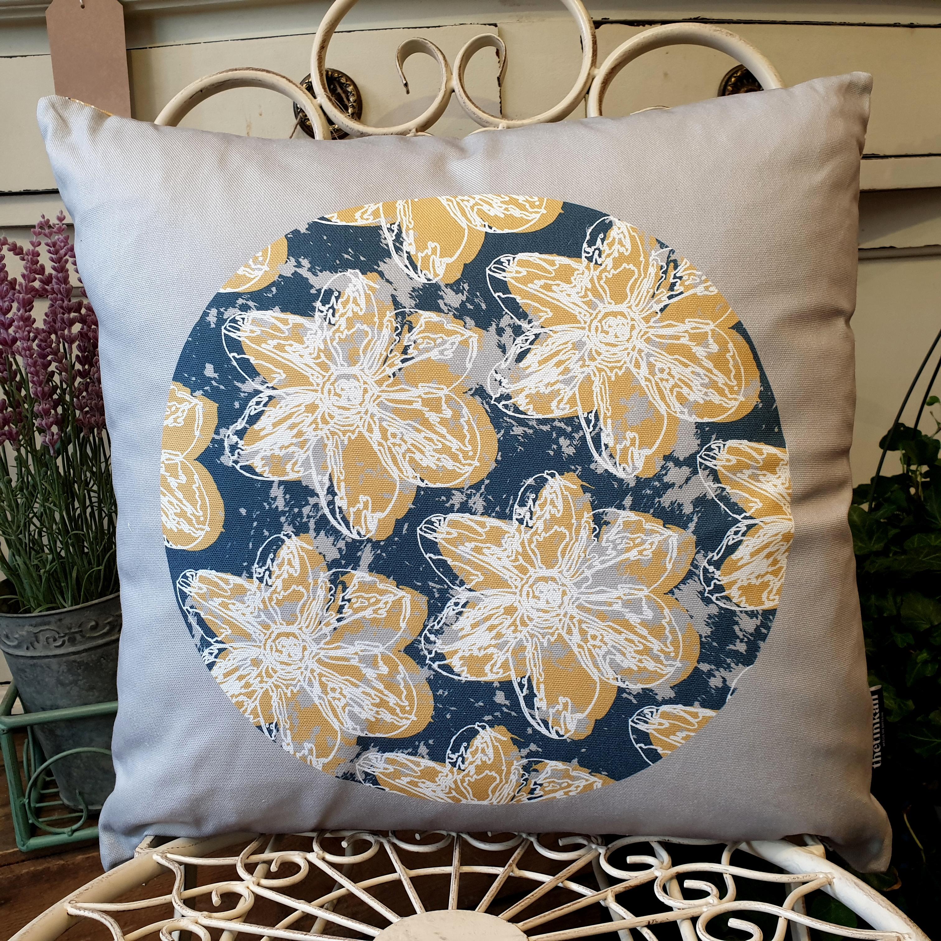 Double-sided 45cm square Flower Splash cushion designed by thetinkan. Mustard yellow narcissus flower with white traced outline set in an oxford blue coloured circle with pale grey paint splashes and pale grey surround. Available with an optional luxury cushion inner pad. VIEW PRODUCT >>