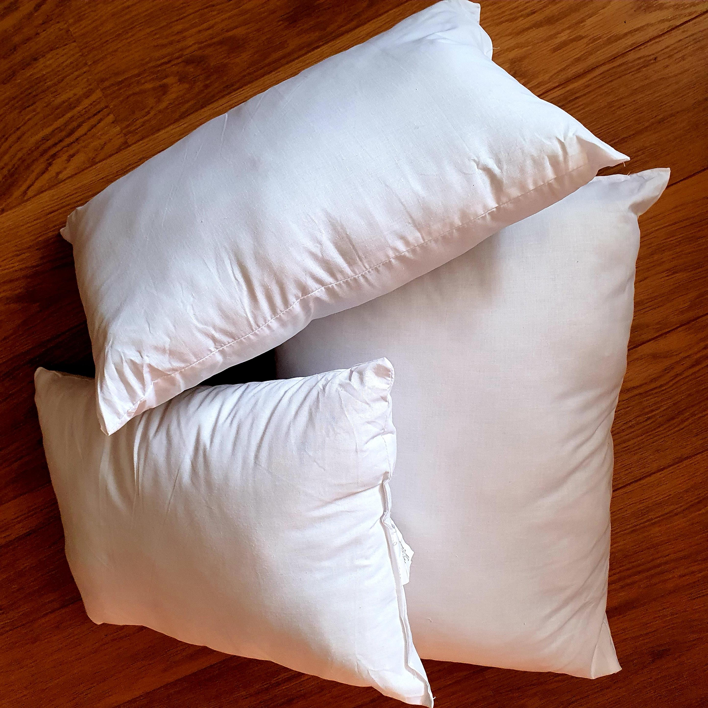 Group shot of cushion inner pads generously filled with Eco-Hollowfibre made from recycled plastic bottles in white poly cotton outer cover.