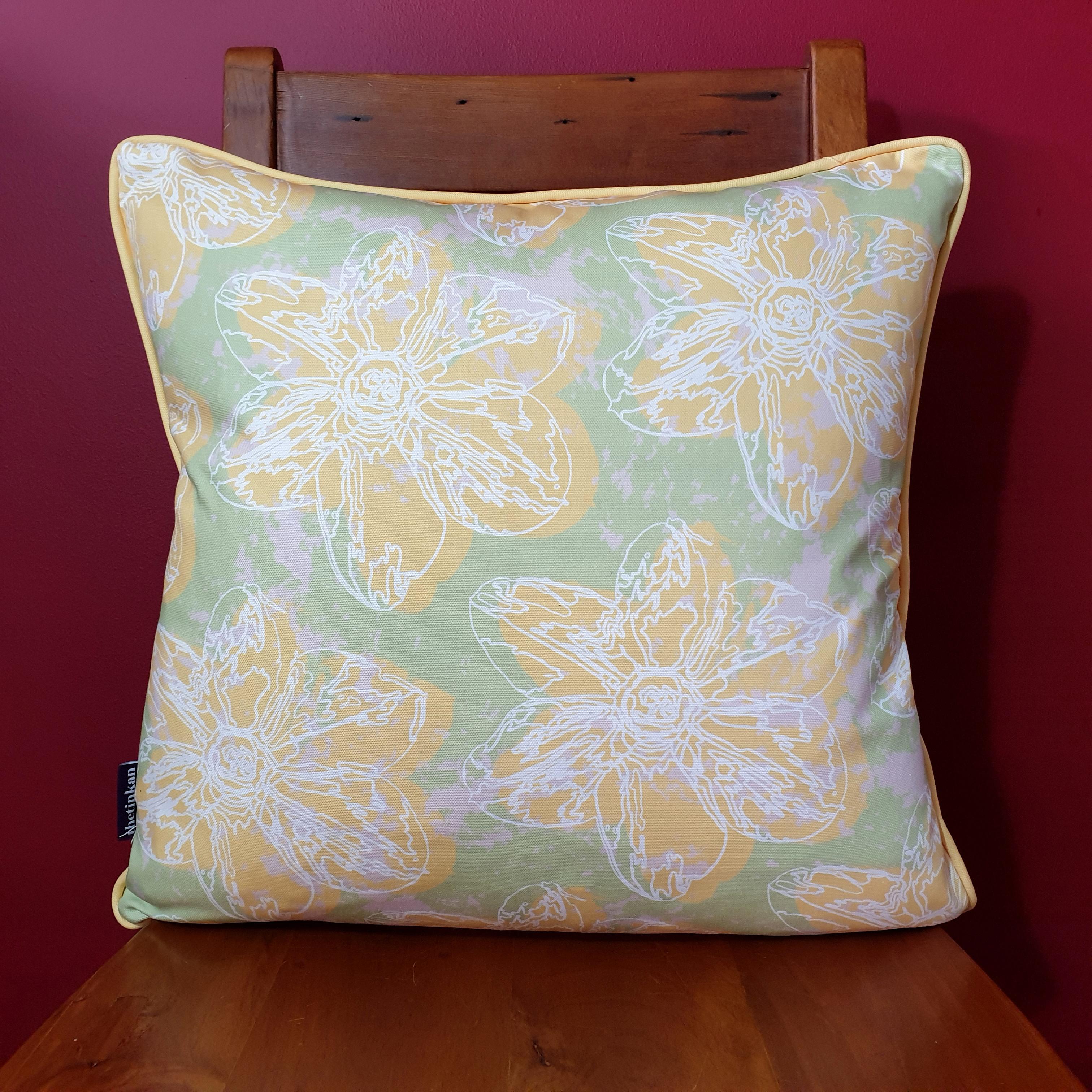 Double-sided 51cm square Flower Splash cushion designed by thetinkan. Yellow narcissus flower and yellow piping with white traced outline set within a mint green background with pale pink paint splashes. Available with an optional luxury cushion inner pad. VIEW PRODUCT >>