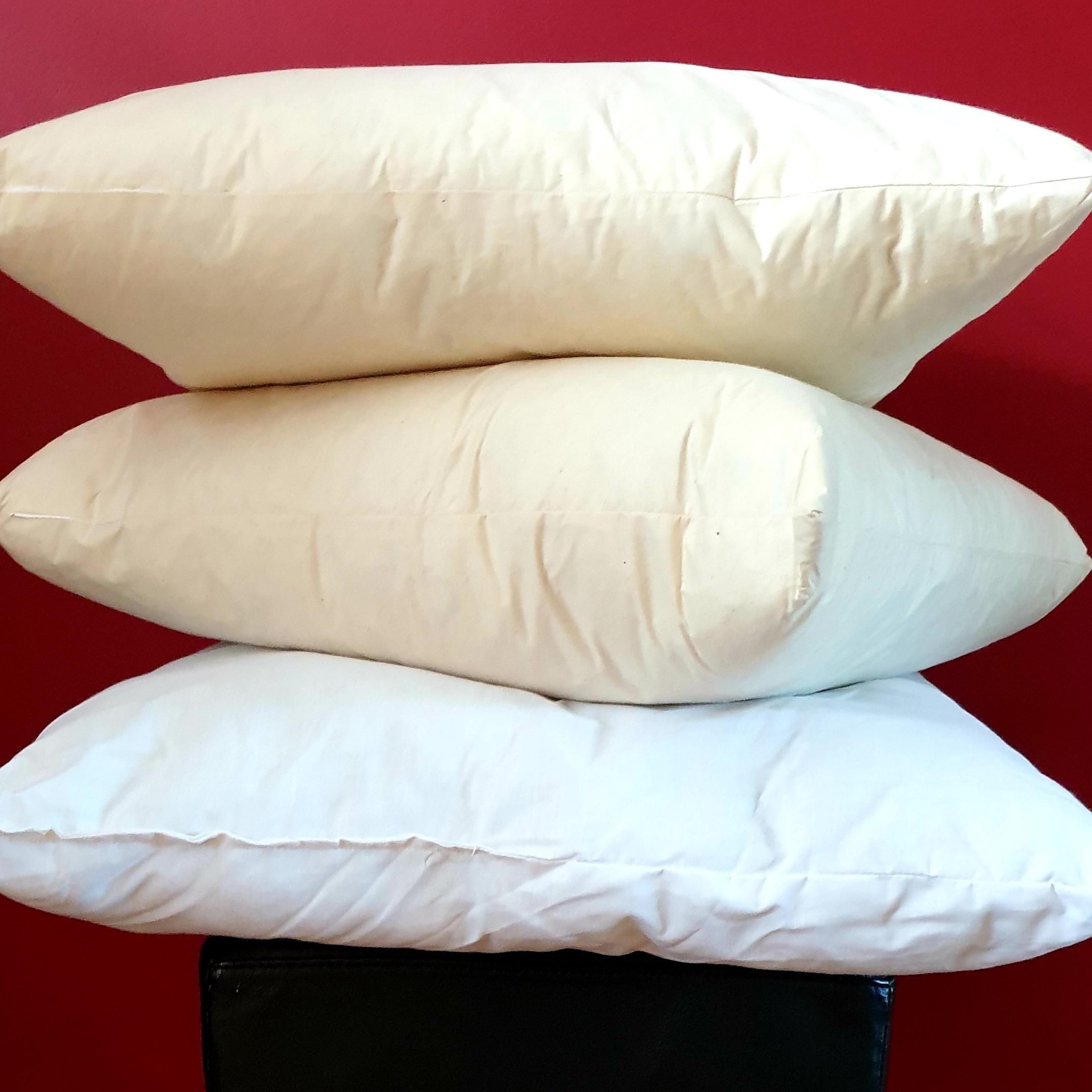 Group shot of the three main types of cushion inner pad from thetinkan. Eco-Hollowfibre, duck feather and duck feather & down.