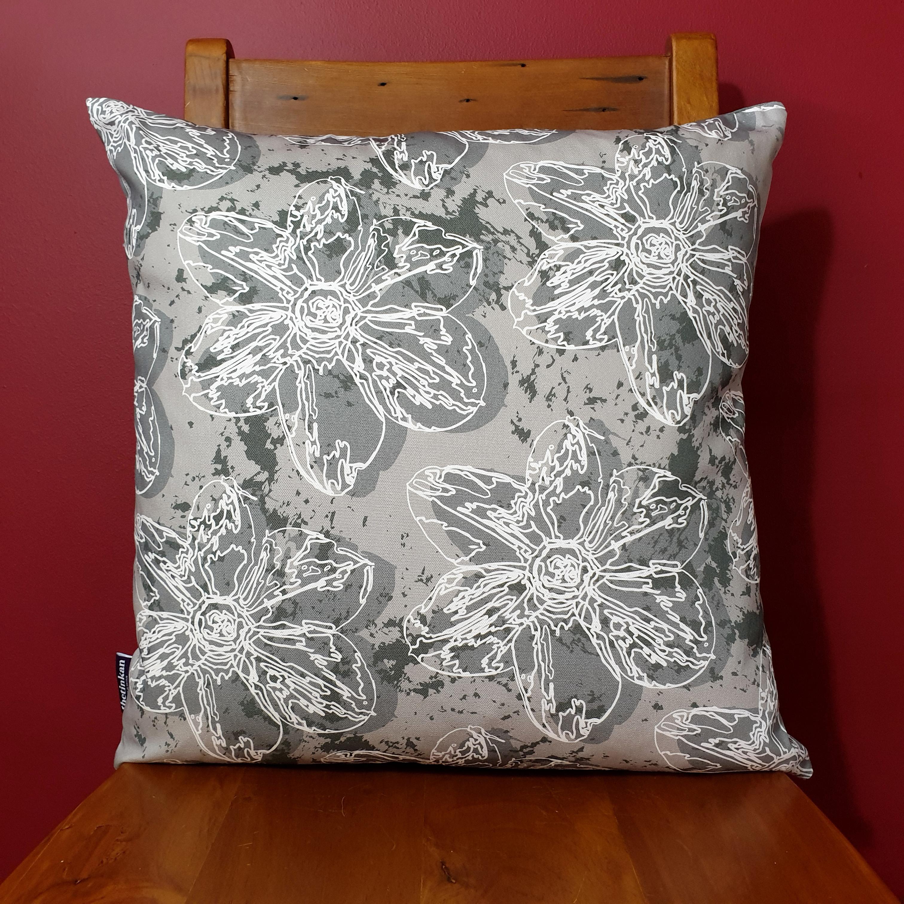Double-sided 51cm square Flower Splash cushion designed by thetinkan. Dark grey narcissus flower with white traced outline set within a grey background with charcoal grey paint splashes. Available with an optional luxury cushion inner pad. VIEW PRODUCT >>