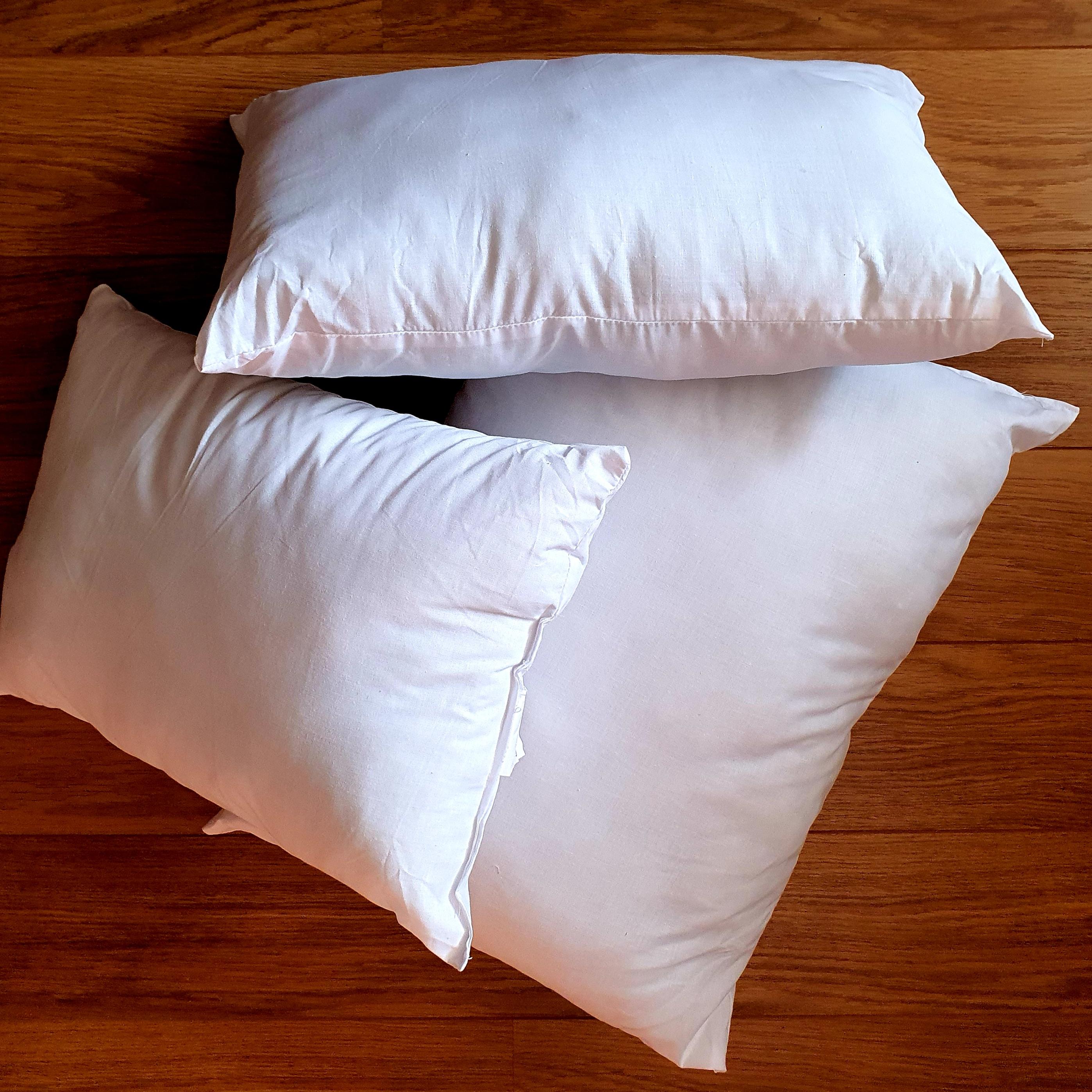 Group shot of cushion inner pads generously filled with Eco-Hollowfibre made from recycled plastic bottles in white poly cotton outer cover.