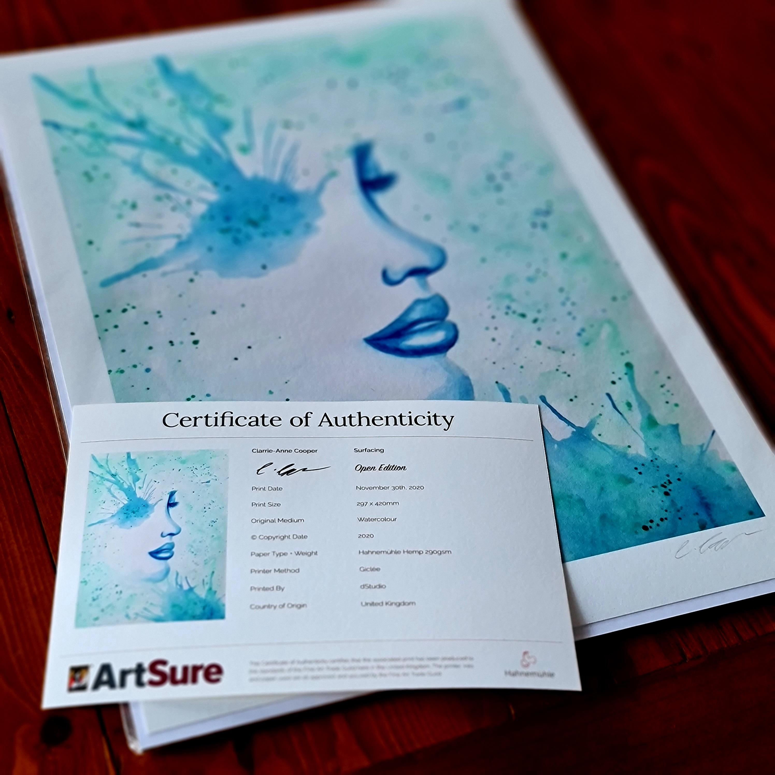 A watercolour print by Clarrie-Anne on eco fine art paper titled Surfacing showing a black watercolour outlined female face with a blue paint splattered eye and paint splatters across the picture. Print shown with certificate.