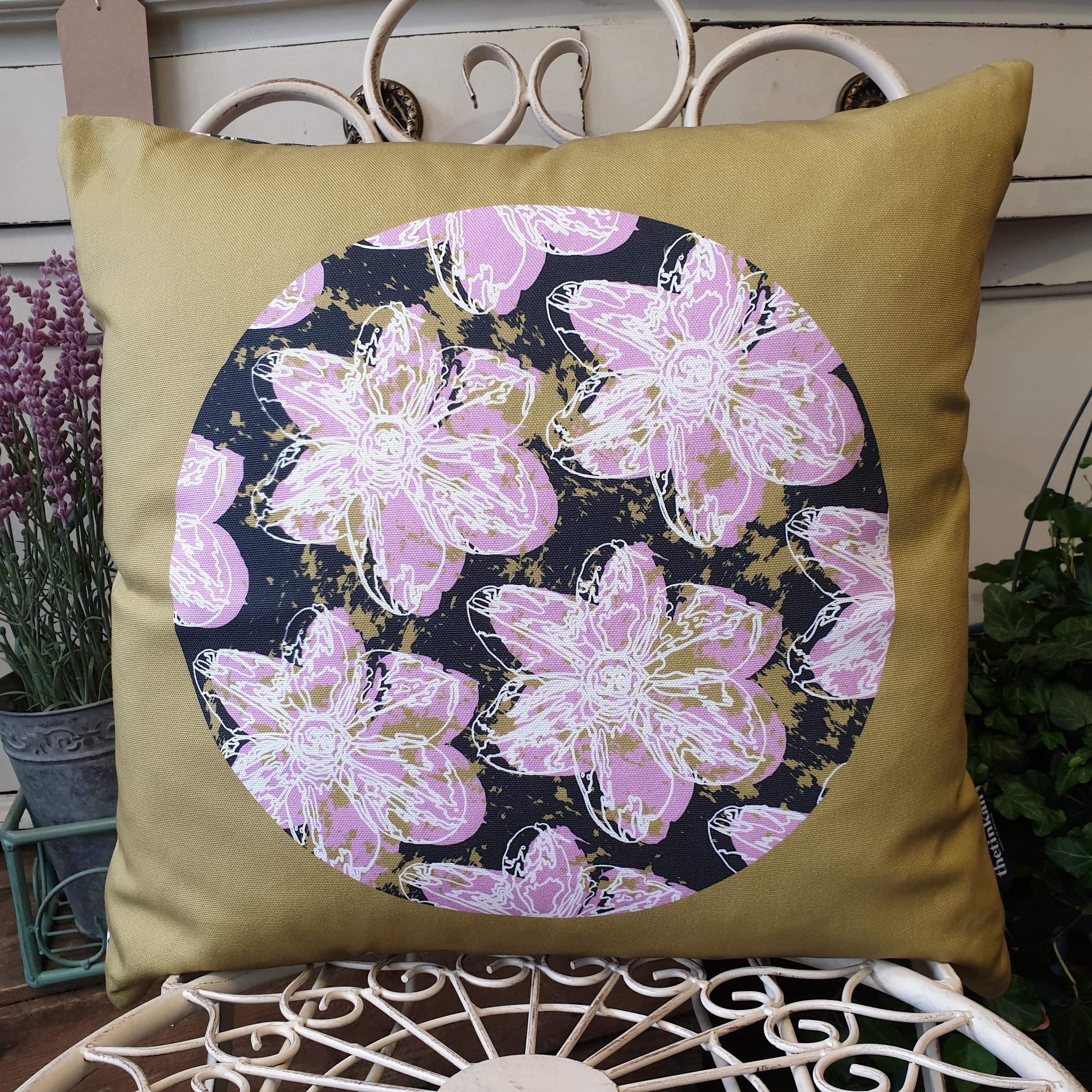 Double-sided 45cm square Flower Splash cushion designed by thetinkan. Candy pink narcissus flower with white traced outline set in a dark charcoal grey coloured circle with olive paint splashes and olive green surround. Available with an optional luxury cushion inner pad. VIEW PRODUCT >>