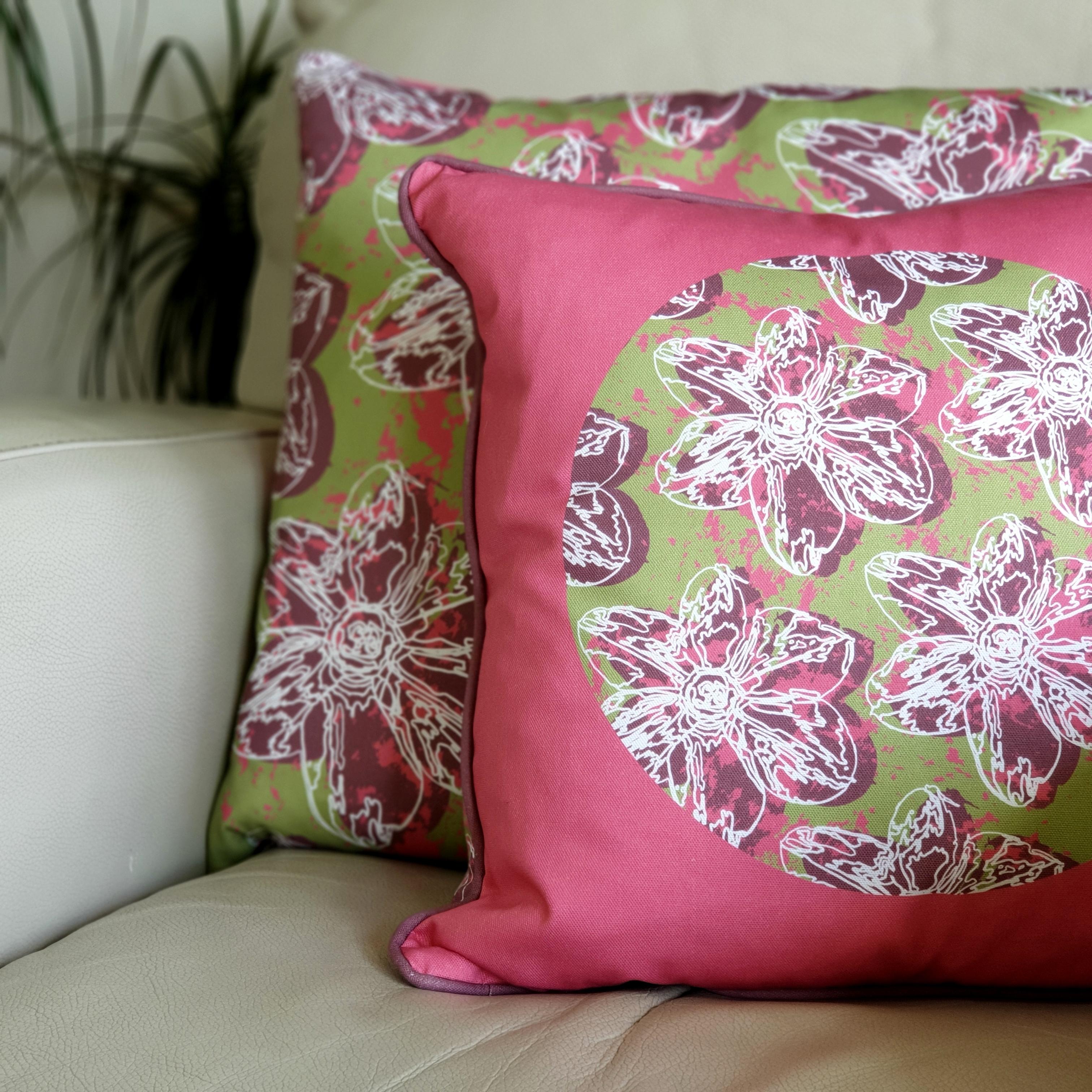 Double-sided 45cm square & 51cm square Flower Splash cushions, showing both sides, designed by thetinkan. Dark red narcissus flower with white traced outline set within an olive green background with salmon pink paint splashes. Available with an optional luxury cushion inner pad. VIEW PRODUCT >>