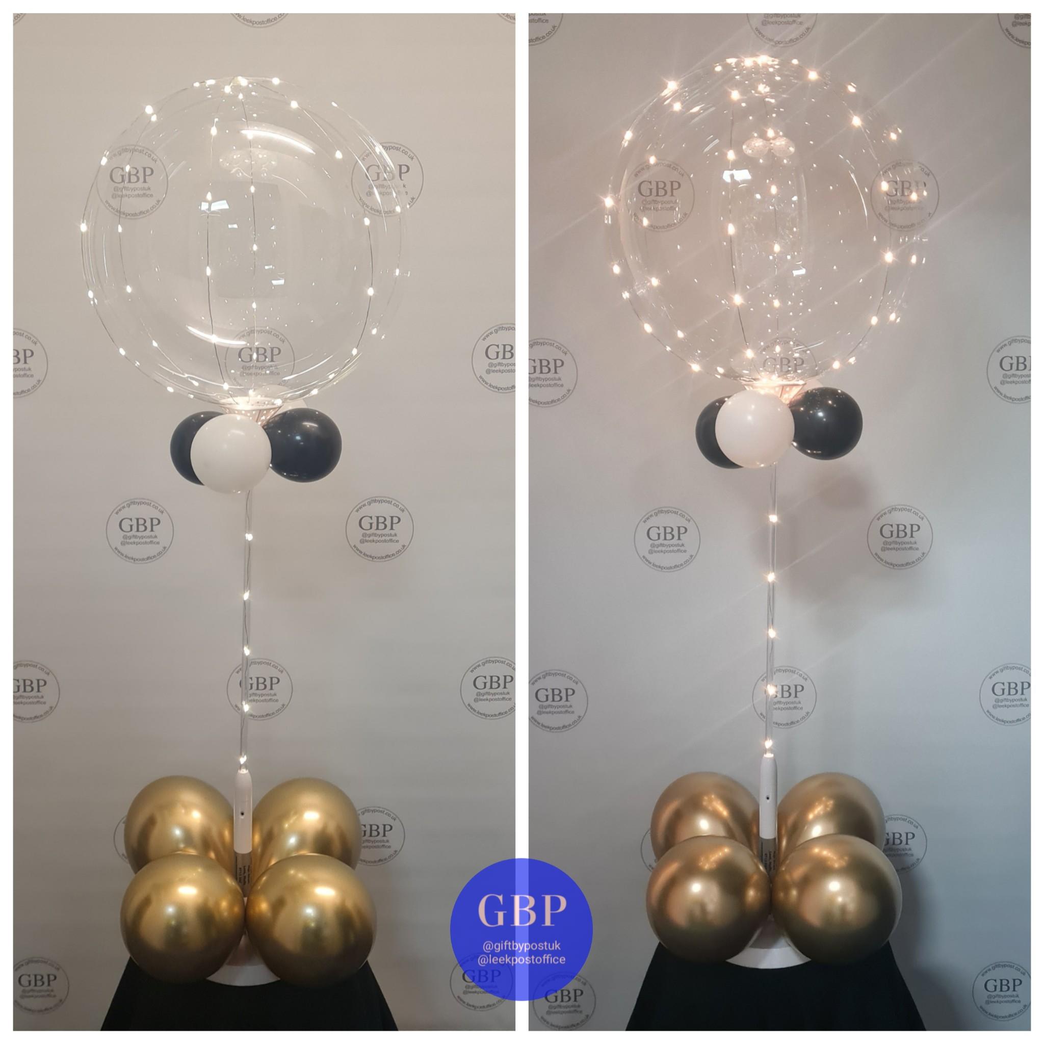 Clear LED with Black and Gold Balloons