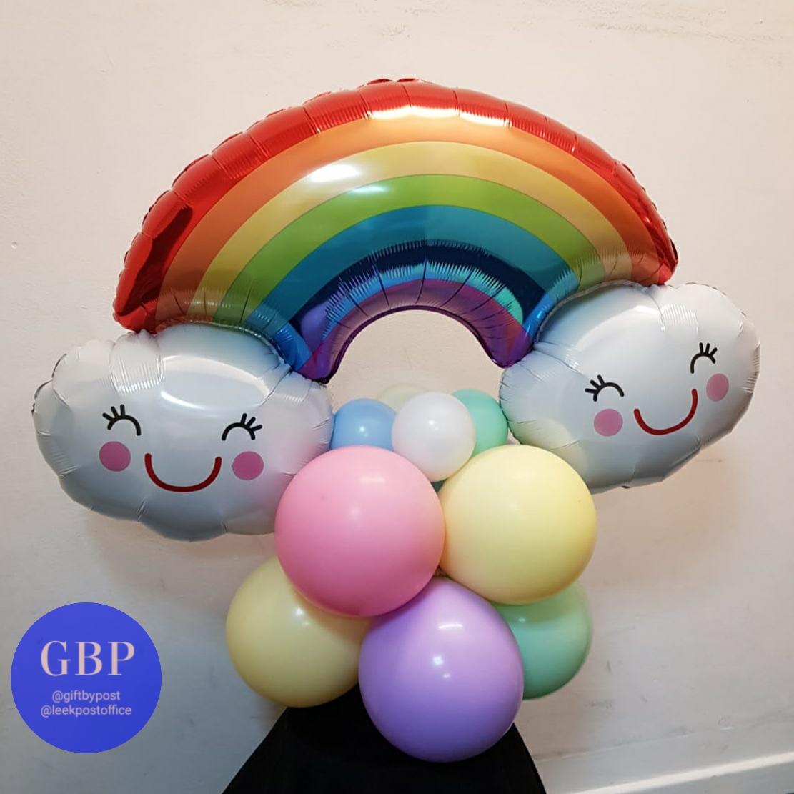 Rainbow helium balloon on a base