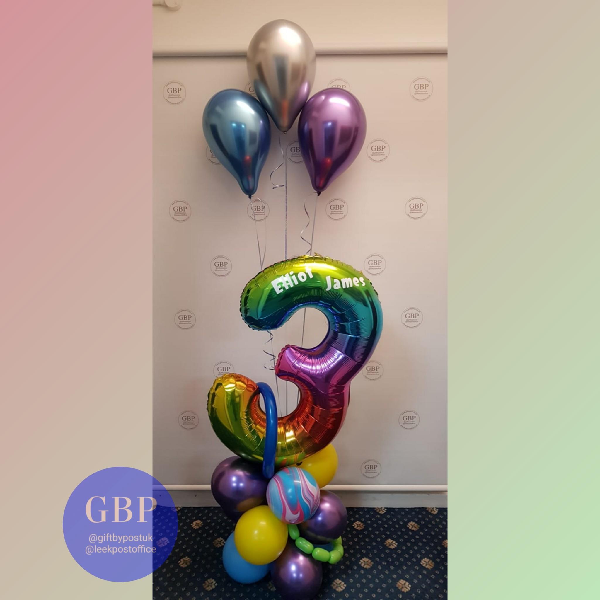 Large number 3 balloon, multi, on a base, with attached latex balloons