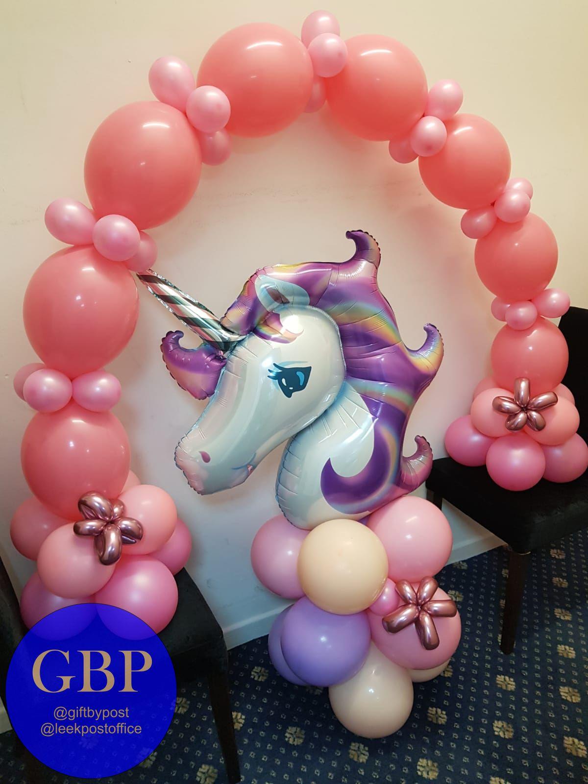 pink link balloon arch with unicorn