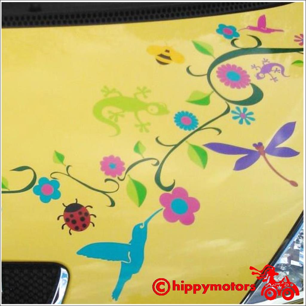 Hippy Motors hummingbird and flower decals on a car