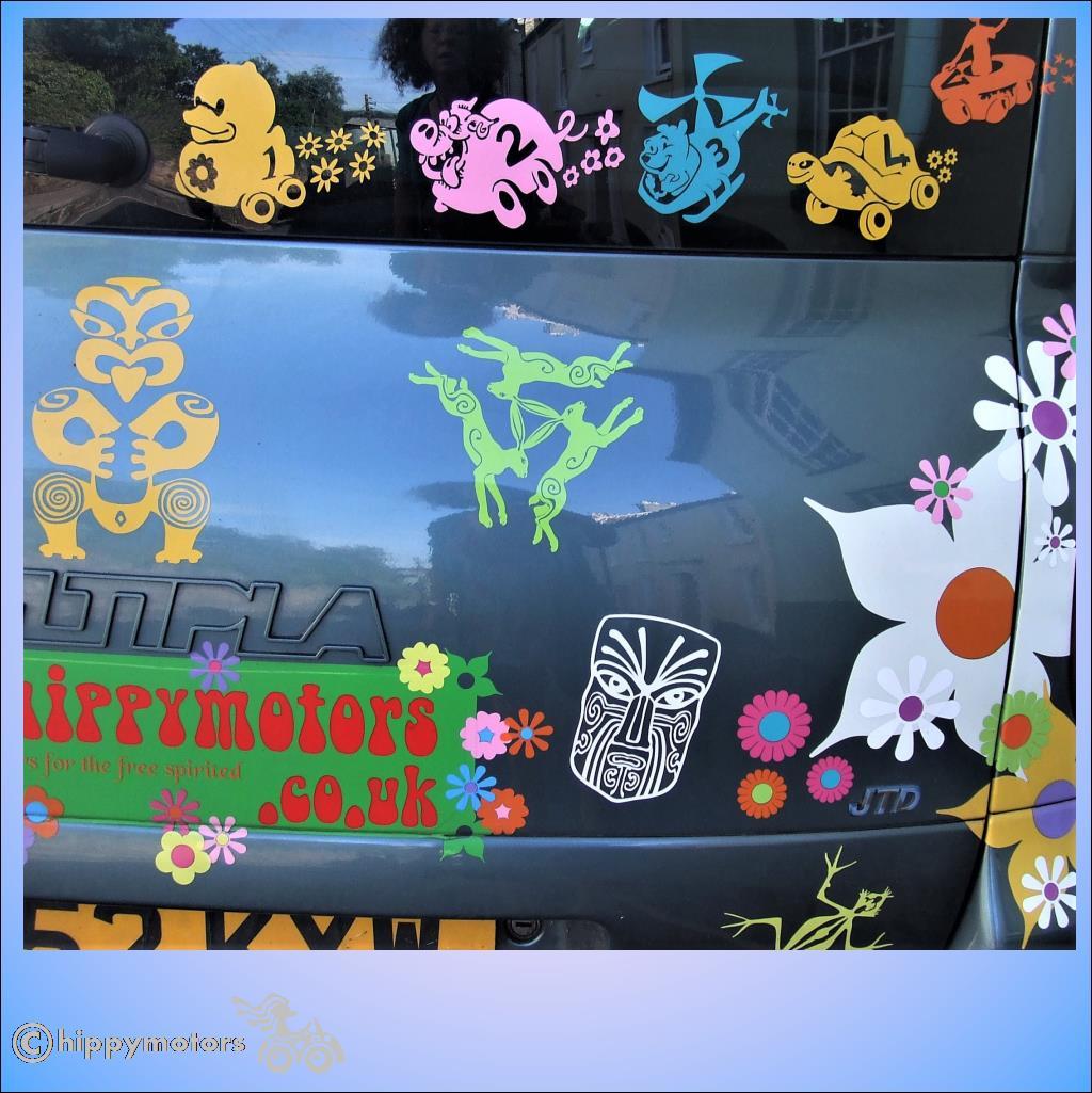 face sticker with flower decals and maori symbols on fiat multipla