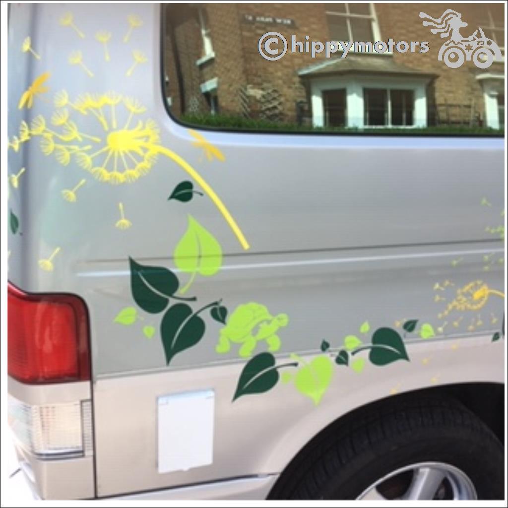 Van with dandelion clock and leaf decals on