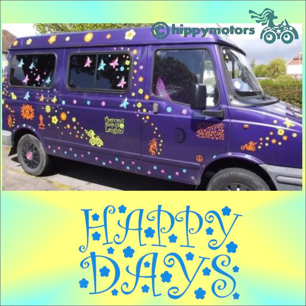 camper van with flowers stickers on with hippy sayings decals