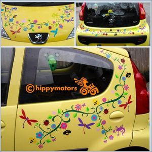 Flower vines dragonfly and gecko sticker kit on a Peugeot car