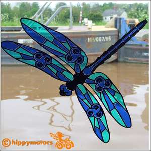 dragonfly window sticker on canal boat glass