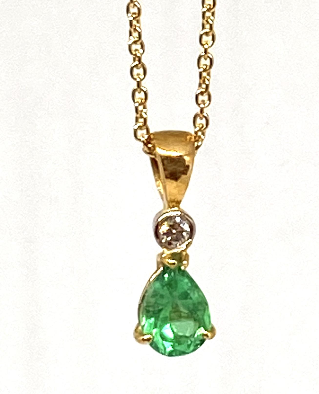 18ct gold emerald and diamond pendant
