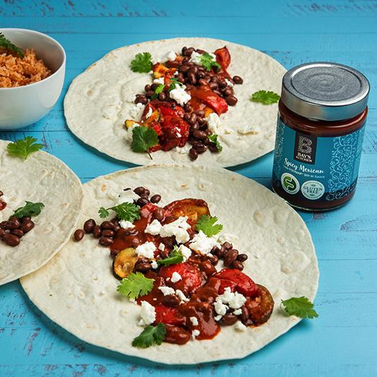 Three fajitas made with Bay's Kitchen Spicy Mexican sauce
