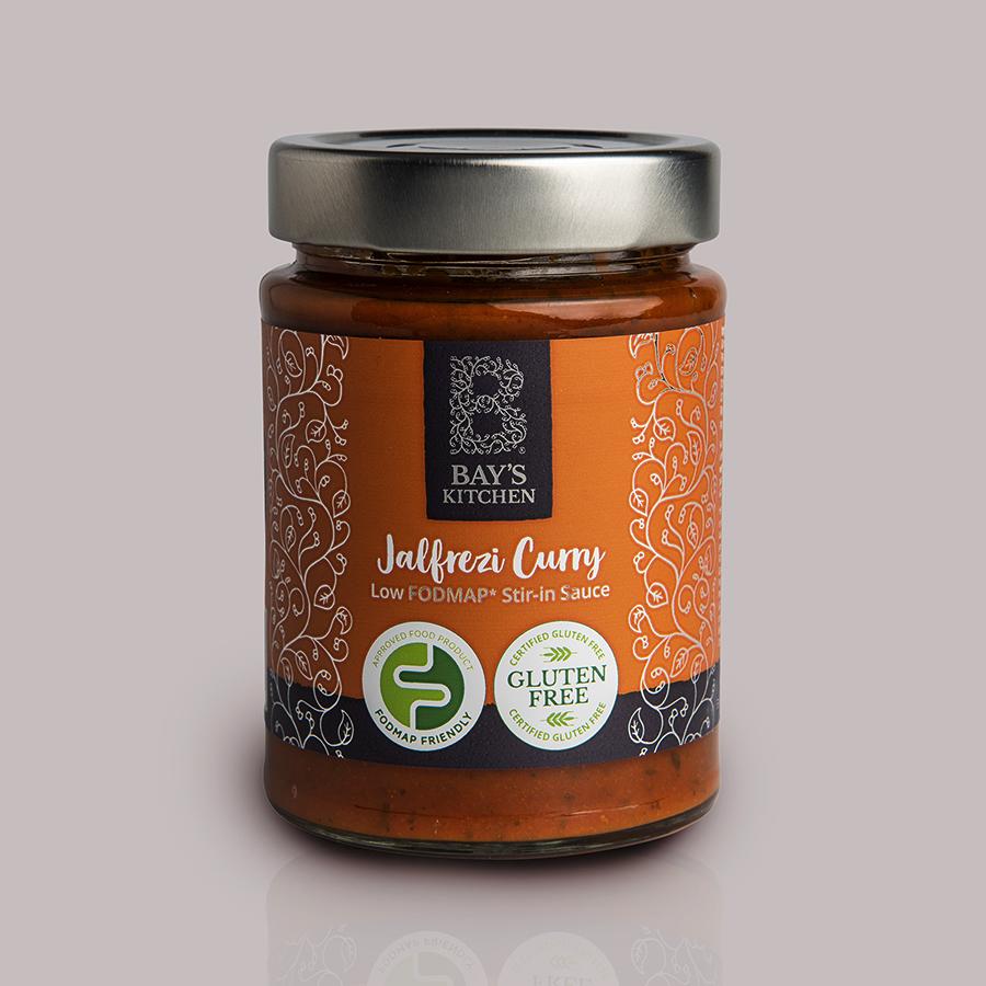 A jar of Bay's Kitchen Jalfrezi curry sauce on a grey background