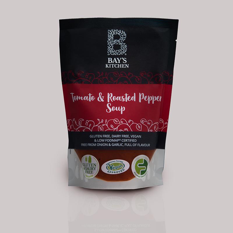 A packet of Bay's Kitchen Tomato & Roasted Pepper soup on a grey background