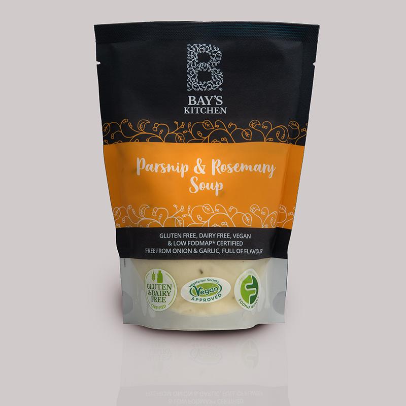 A packet of Bay's Kitchen Parsnip & Rosemary soup on a grey background