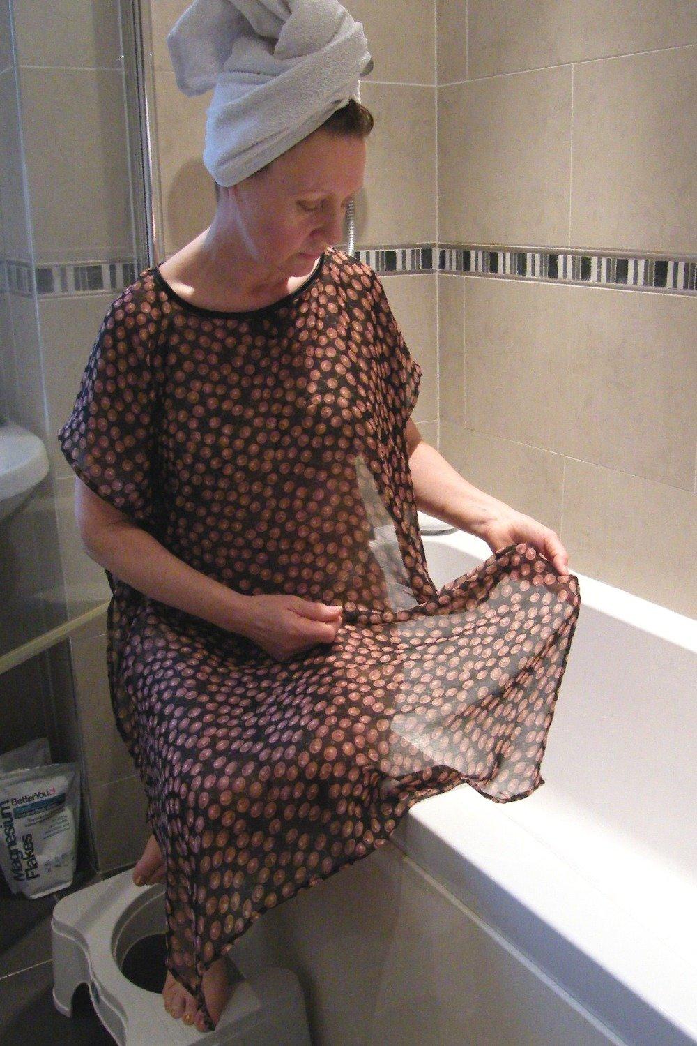 Black/Tan cherries NeverNaked(tm) Shower Drapron® / dementia dignity showering cape drapes over shoulders to be left on whilst showering so dignity is maintained