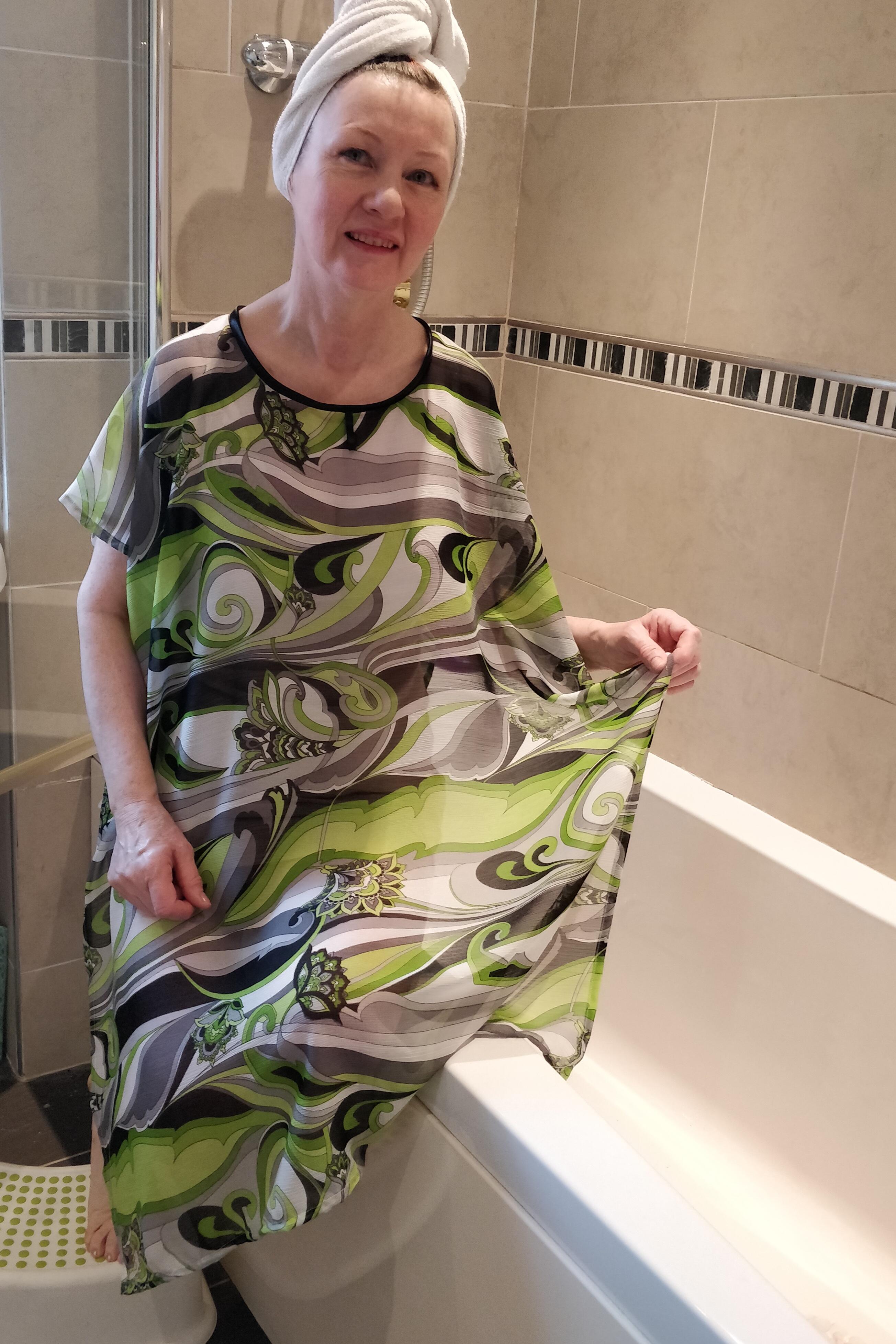 Shower Robe in Lime/Black swirl. The NeverNaked(tm) Shower Drapron® provides modesty, dignity and privacy whilst being helped to shower or bathe. Shower modesty wear. Bathing modesty gown. Lightweight crepe chiffon. Slips over shoulders - No sleeves Magnetic fastening at back
