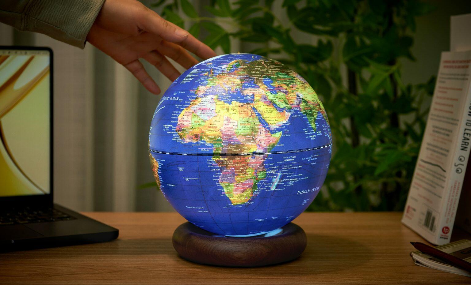 Fifth image for the Large Dark Ocean Blue Atlas Globe with Walnut Base