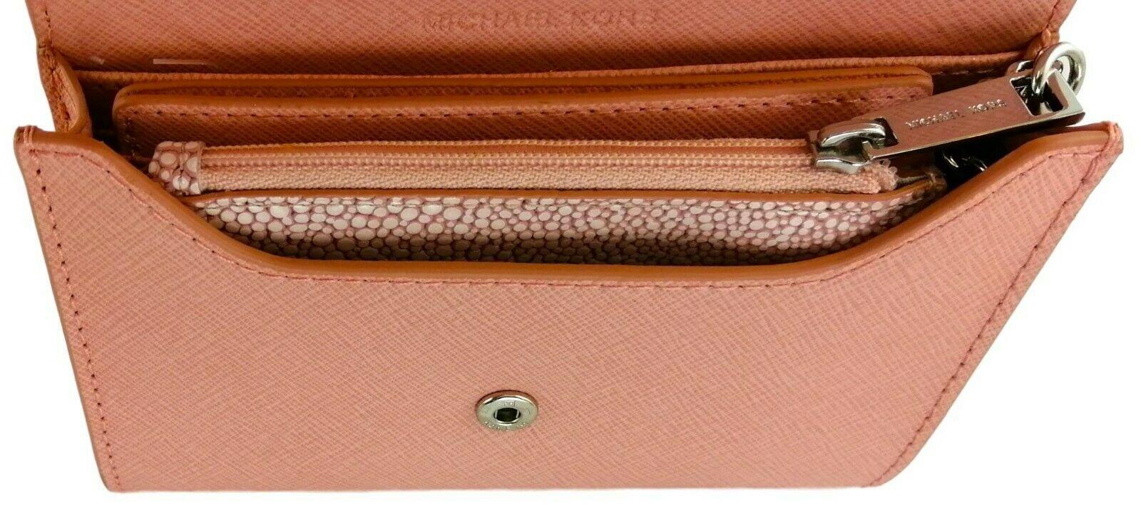 Pale pink michael 2024 kors purse