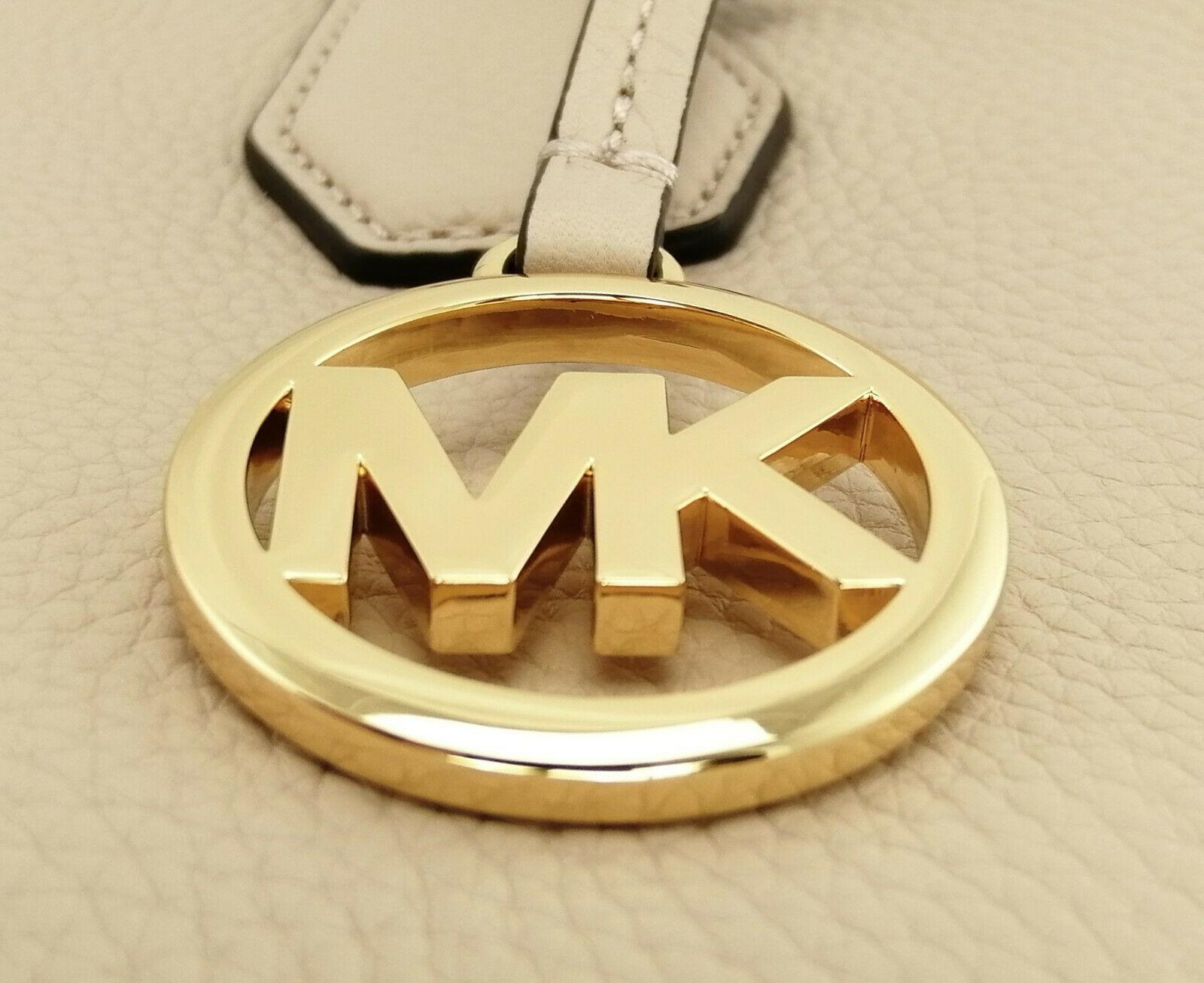 Michael Kors Pink Medium Handbag tag