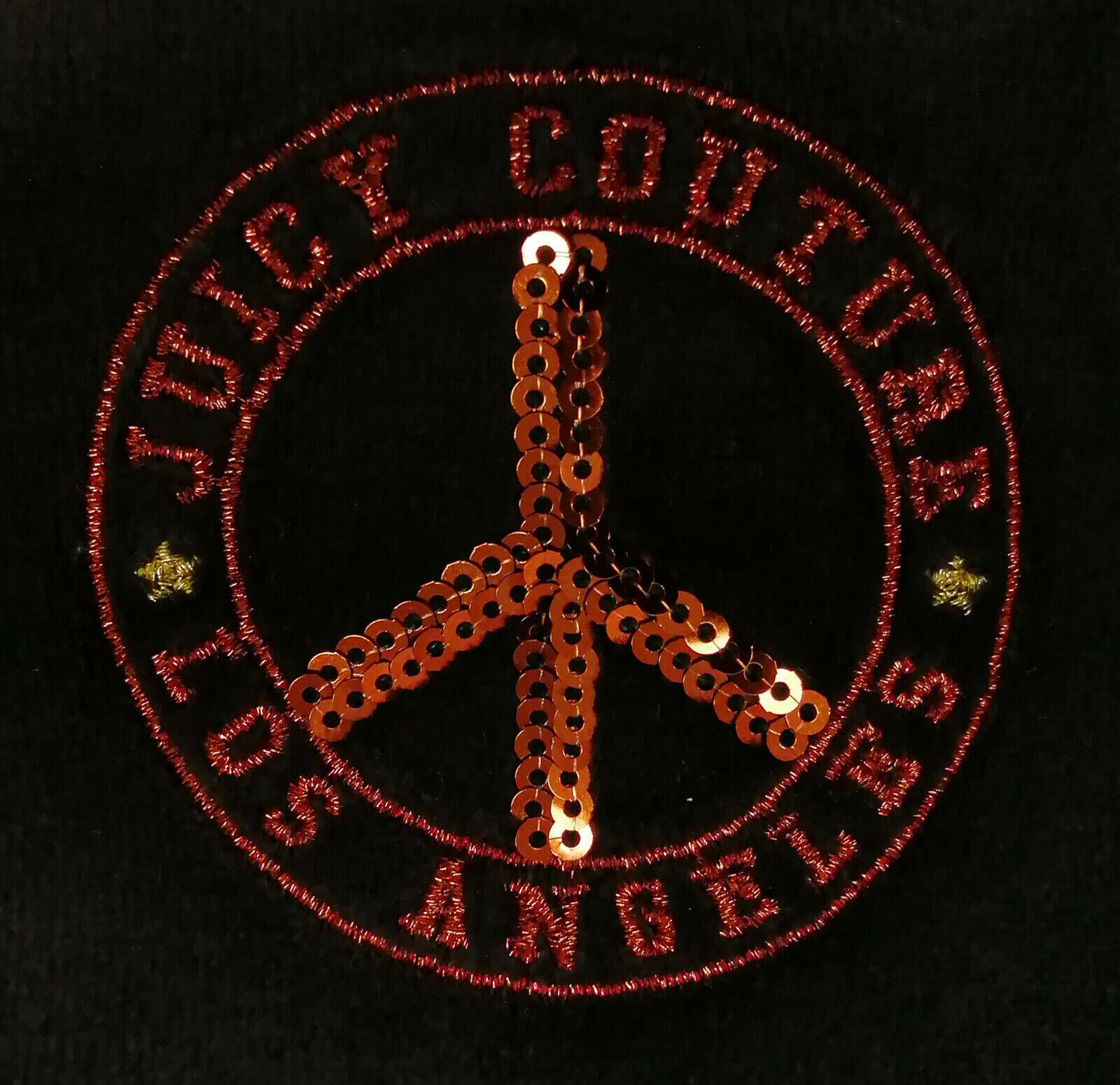 Juicy Couture Black Tracksuits logo close up
