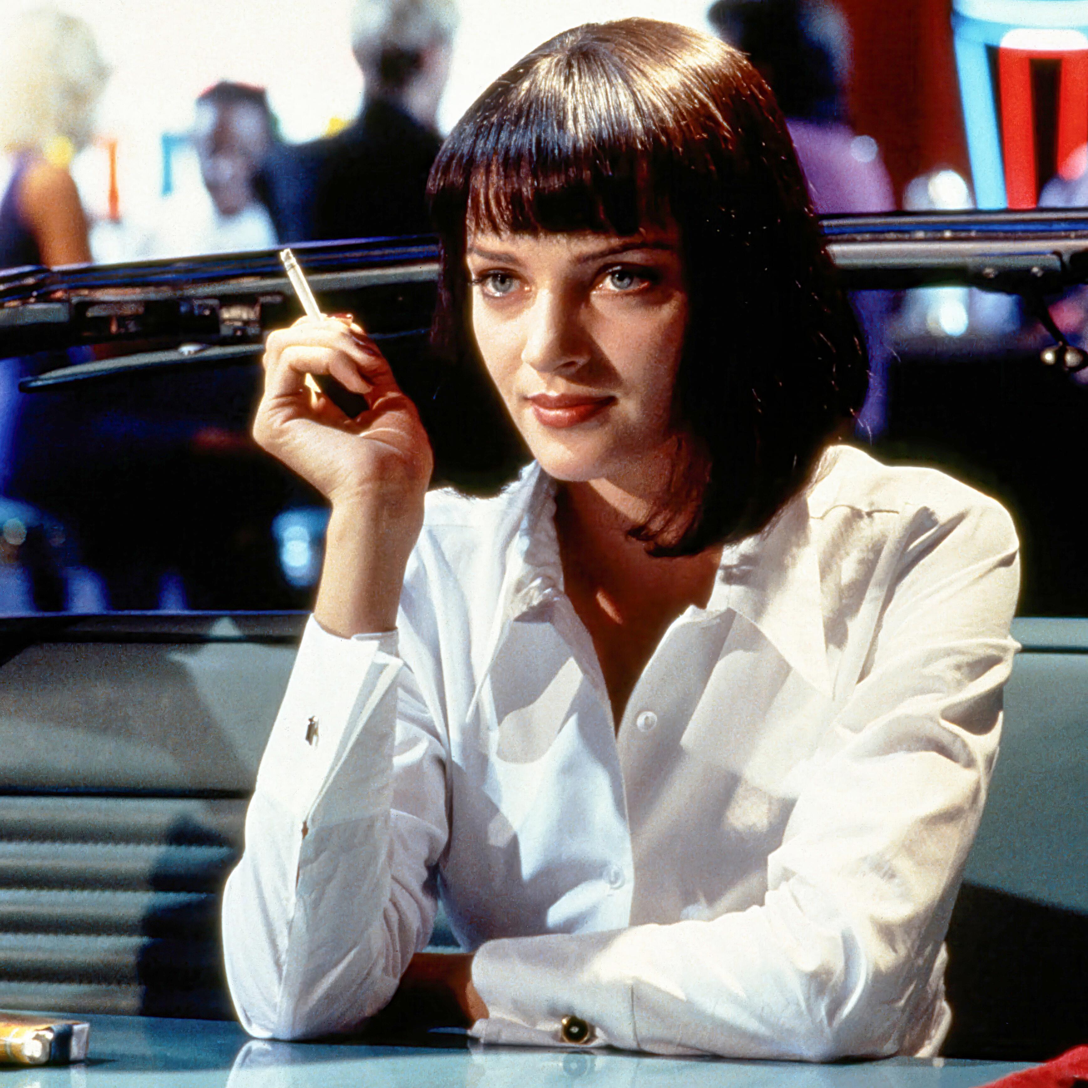2.	Actress, Uma Thurman, posing with a cigarette in her iconic role as Mia Wallace - the charismatic and enigmatic wife of gangster Marsellus Wallace (Ving Rhames) – in Quentin Tarantino’s breakout movie, Pulp Fiction (Miramax, 1994). The image is captured at Jack Rabbit Slim’s, where Mia performs her iconic twist dance with Vincent Vega, a laid-back, sharp-tongued hitman played by John Travolta (Saturday Night Fever, Grease).