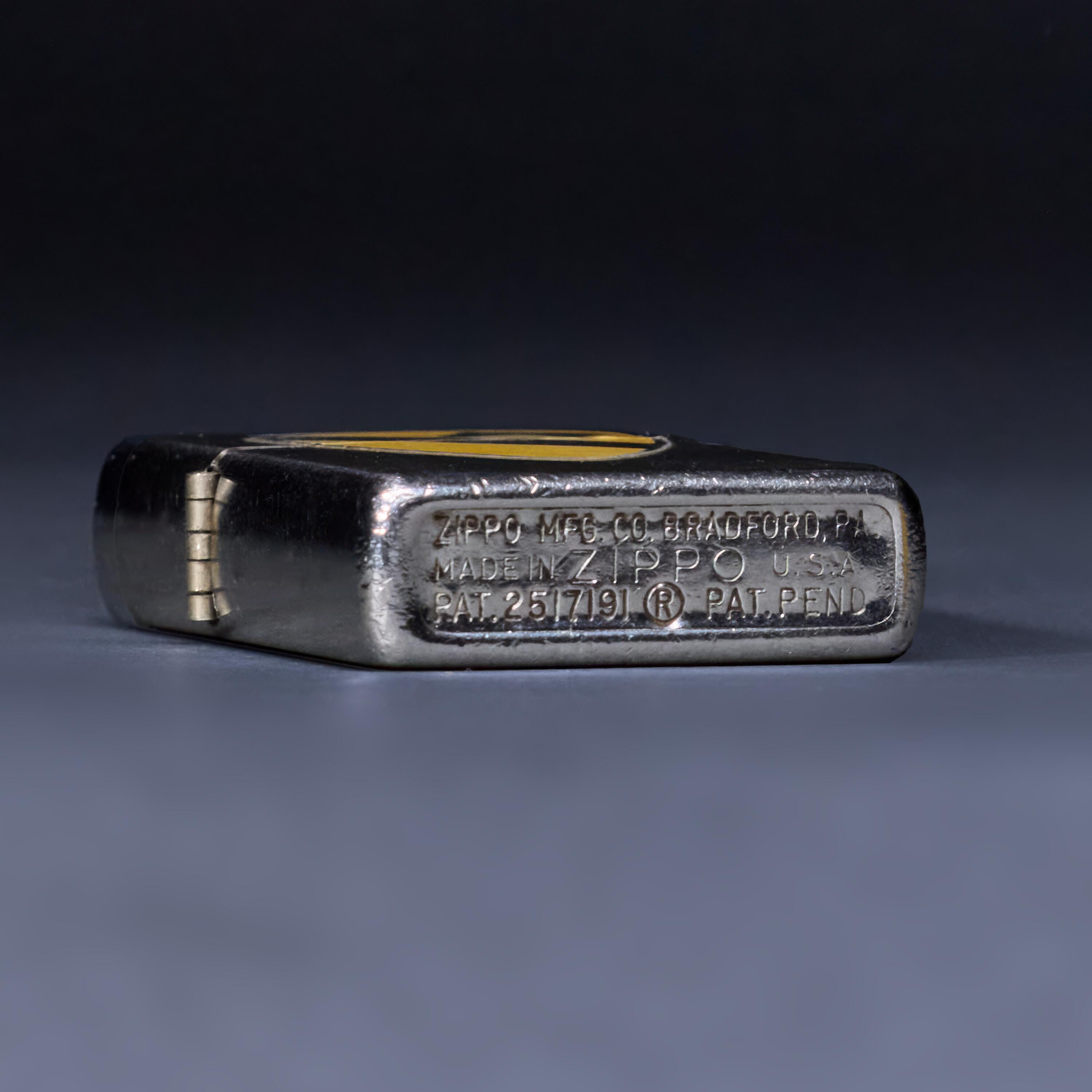 Walk Kowalski's Zippo Lighter- Underside of lighter with engraved markings