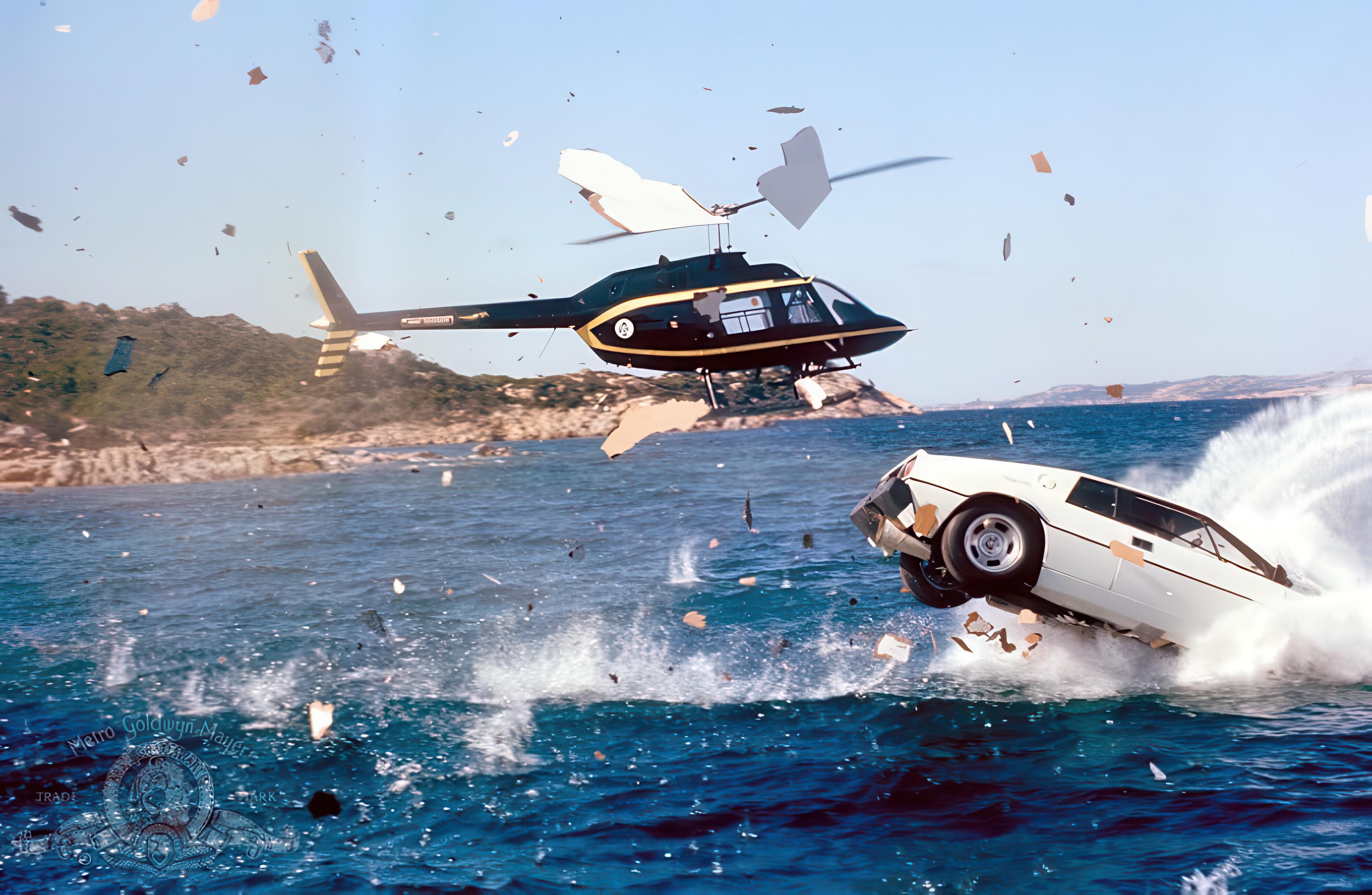 The climax of the legendary Lotus Esprit and helicopter chase from the James Bond film, ‘The Spy who loved Me’ (1977). In the movie’s storyline, the Lotus was adapted to act as a mini-submarine, when submerged in water. The helicopter piloted by beautiful Stromberg assassin, Naomi (Caroline Munro), was blown out of the sky by a sea-to-air missile fired by James Bond (Roger Moore) from the highly adapted Lotus Esprit. The helicopter was actually flown by celebrated stunt pilot, Marc Wollf.